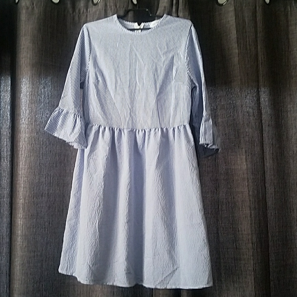 Blue and white striped dress. Never worn.